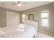 Bedroom featuring a large closet, neutral paint and great natural light from the windows at 103 Colony Point Dr, Punta Gorda, FL 33950