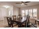 Dining room with a dark wood table, seating for six, and a large window for natural light at 103 Colony Point Dr, Punta Gorda, FL 33950