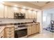 Kitchen with stainless appliances, granite countertops, and wood cabinets at 103 Colony Point Dr, Punta Gorda, FL 33950