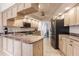 Kitchen with granite countertops, stainless steel appliances, and plenty of cabinet space at 103 Colony Point Dr, Punta Gorda, FL 33950