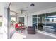 View of luxurious lanai with ceiling fans and outdoor seating area at 103 Colony Point Dr, Punta Gorda, FL 33950