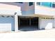 Spacious garage with white doors, providing ample parking and storage space at 11000 Placida Rd # 1501, Placida, FL 33946