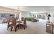 Open concept living room and dining area offers a spacious setting with a large window at 11000 Placida Rd # 1501, Placida, FL 33946