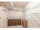 Spacious walk-in closet with shelving and ample storage options, and storage drawers at 11000 Placida Rd # 1501, Placida, FL 33946