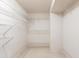 Empty walk-in closet with shelving ready for organization at 11000 Placida Rd # 1501, Placida, FL 33946