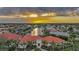Stunning aerial view of a waterfront home in a community with canals and lush vegetation at 1111 San Mateo Dr, Punta Gorda, FL 33950