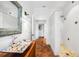 Bright bathroom features tile floors, a walk-in shower and designer sink at 1111 San Mateo Dr, Punta Gorda, FL 33950
