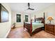 Spacious bedroom features tile flooring and a ceiling fan at 1111 San Mateo Dr, Punta Gorda, FL 33950