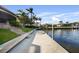 Dock on the water provides easy access for boating and recreation at 1111 San Mateo Dr, Punta Gorda, FL 33950