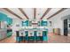 Modern kitchen featuring custom cabinetry, stone countertops, and an open design, ideal for culinary enthusiasts at 1111 San Mateo Dr, Punta Gorda, FL 33950