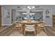 Bright dining room with open floorplan and views of the pool area at 131 Buckeye Nw Ave, Port Charlotte, FL 33952