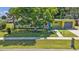 A charming home with an inviting front yard and colorful curb appeal at 131 Buckeye Nw Ave, Port Charlotte, FL 33952