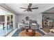 Relaxing living room with view to the outdoors, comfortable seating and unique decor at 131 Buckeye Nw Ave, Port Charlotte, FL 33952