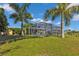 An inviting screened-in pool offering a relaxing oasis in the backyard at 131 Buckeye Nw Ave, Port Charlotte, FL 33952