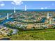 Breathtaking aerial view of a waterfront community with stunning blue waters and lush greenery at 1341 Pine Siskin Dr, Punta Gorda, FL 33950