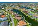 Beautiful aerial shot of a waterfront property with a private boat dock on a sunny day at 1341 Pine Siskin Dr, Punta Gorda, FL 33950