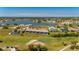 Aerial view showcasing a condo close to the neighborhood with an amazing lake view at 1408 San Cristobal Ave # 4, Punta Gorda, FL 33983