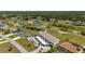 Scenic aerial view of the condo community, highlighting the golf course and nearby amenities at 1408 San Cristobal Ave # 4, Punta Gorda, FL 33983