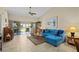 Inviting living room with lanai access, offering beautiful views and ample natural light at 1408 San Cristobal Ave # 4, Punta Gorda, FL 33983