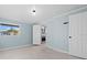 Bedroom featuring tiled floors, fresh paint and natural light from the window at 146 Francis Ne Dr, Port Charlotte, FL 33952
