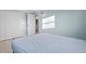 Bedroom featuring a closet and easy access to a bathroom at 146 Francis Ne Dr, Port Charlotte, FL 33952