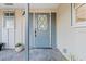 Elegant front door with decorative glass, complemented by stylish shutters and a welcoming tiled entryway at 146 Francis Ne Dr, Port Charlotte, FL 33952