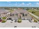Aerial view of home exterior and surroundings in a well-maintained neighborhood at 17094 Acapulco Rd # 312, Punta Gorda, FL 33955