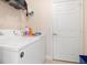 Laundry area with washer and dryer, and storage shelf at 17094 Acapulco Rd # 312, Punta Gorda, FL 33955