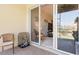 Enclosed patio with tile flooring and sliding glass doors leading to interior living area at 17094 Acapulco Rd # 312, Punta Gorda, FL 33955