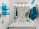 Bright bathroom with a vanity and stylish fixtures at 19505 Quesada Ave # F103, Port Charlotte, FL 33948