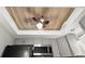 Ceiling design in kitchen featuring a wood panel design and modern ceiling fan at 19505 Quesada Ave # F103, Port Charlotte, FL 33948