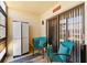 Relaxing patio space with comfortable seating, storage, and serene views at 19505 Quesada Ave # F103, Port Charlotte, FL 33948