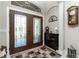 Welcoming foyer featuring a decorative glass door and elegant interior accents at 21 Manizaks Ave, Punta Gorda, FL 33983