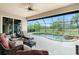 Beautiful screened-in lanai with a unique freeform pool, spa, and waterfall feature at 21 Manizaks Ave, Punta Gorda, FL 33983