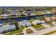An aerial view of a canal front home featuring a private boat dock at 21269 Edgewater Dr, Port Charlotte, FL 33952