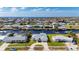 Aerial shot of a waterfront home in a canal community with ocean views at 21269 Edgewater Dr, Port Charlotte, FL 33952