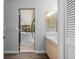 Bathroom showcasing the vanity with a view of the screened patio at 21269 Edgewater Dr, Port Charlotte, FL 33952