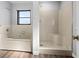 Bathroom featuring a soaking tub and a separate shower at 21269 Edgewater Dr, Port Charlotte, FL 33952