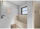 Bathroom featuring a soaking tub and a modern vanity sink at 21269 Edgewater Dr, Port Charlotte, FL 33952