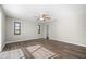 Large bedroom with new flooring, ceiling fan, and closet door at 21269 Edgewater Dr, Port Charlotte, FL 33952