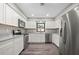 Updated kitchen with stainless steel appliances and ample counter space at 21269 Edgewater Dr, Port Charlotte, FL 33952