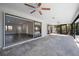 Enclosed lanai featuring ceiling fans, and an entrance to the living area at 21269 Edgewater Dr, Port Charlotte, FL 33952