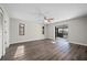 Spacious living room with sliding glass doors leading to the outdoor lanai at 21269 Edgewater Dr, Port Charlotte, FL 33952