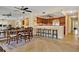 Inviting dining area with a large table, chairs, and a mirrored wall for added ambiance at 220 Coldeway Dr # 211, Punta Gorda, FL 33950