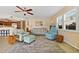 Comfortable living room with tile floors, plush seating, and an open flow to the kitchen at 220 Coldeway Dr # 211, Punta Gorda, FL 33950