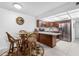 Modern kitchen featuring stainless steel appliances and a breakfast bar at 2300 Aaron St # 106, Port Charlotte, FL 33952