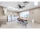 A well-maintained laundry room featuring multiple washers, a folding table, ample lighting, and a pleasant atmosphere for residents at 2300 Aaron St # 106, Port Charlotte, FL 33952
