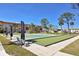 Recreational lawn bowling area with multiple lanes and seating provides a relaxing outdoor activity at 2300 Aaron St # 106, Port Charlotte, FL 33952