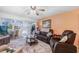 Cozy living room with comfortable seating and sliding glass doors to outdoor patio at 2300 Aaron St # 106, Port Charlotte, FL 33952