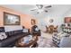 Comfortable living room area with furnishings and an adjacent dining space at 2300 Aaron St # 106, Port Charlotte, FL 33952
